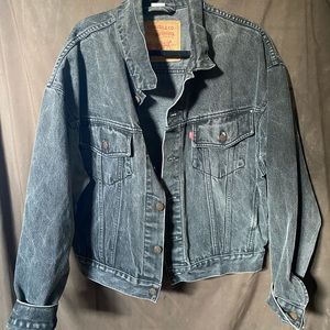 Levi’s, medium black jean jacket.